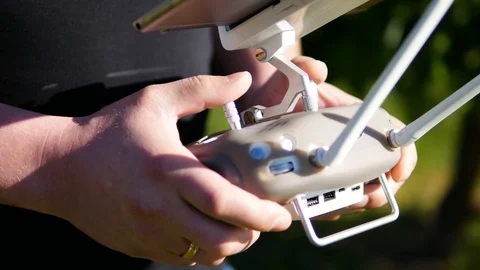 Man Using Quadcopter. Hexacopter Flying Machine Drone With Remote Control Stock Footage 91150368