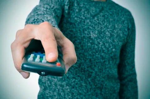 Man using a remote control Stock Photos
