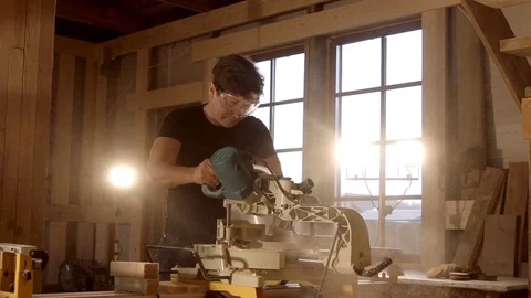 Man using saw in slow motion Stock Footage 72658963