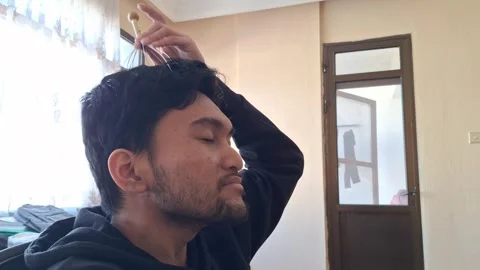 Man Using Scalp Head Massager Stock Footage 330759855