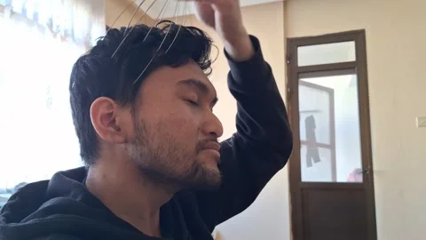 Man Using Scalp Head Massager Stock Footage 330759891