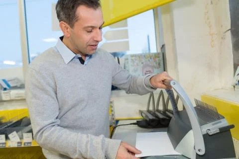 Man using scanner multifunction Stock Photos