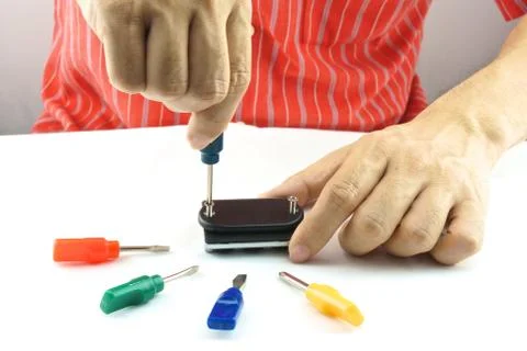 Man using screwdriver for repair Stock Photos