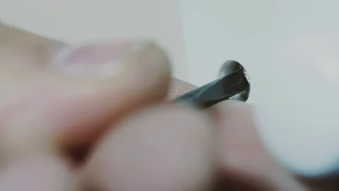 Man using screwdriver to tighten an electrical socket Stock Footage 77680300