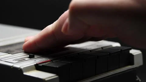 Man using a small retro portable tape recorder Video stock 169683966