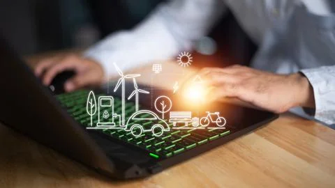 Man using a smart home control system on a laptop with application that con.. Stockfoto's