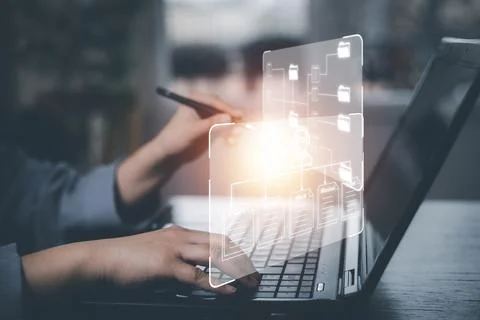 Man using smart phone and touch folder of document Management System, online  Stock Photos