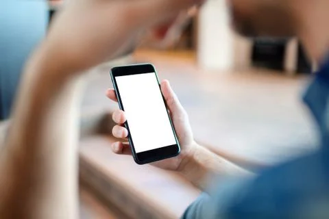 Man is using smart phone. Clipping path included. Stock Photos