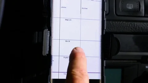 A man using a smart phone GPS while driving Stock Footage 78288116