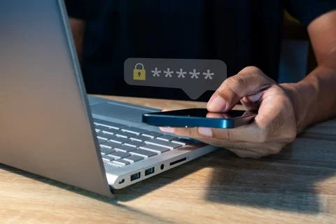 A man using smart phone to login for validate password to two-step authenti.. Stock Photos