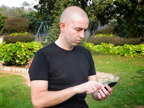 Man using a smart phone Stock Photos
