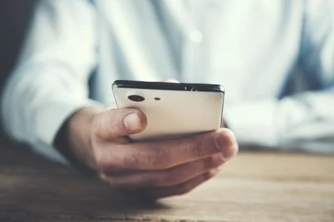 Man using a smart phone Stock Photos