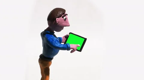 Man Using Smart Phone Tablet with Green Screen Clay Animation Isolated on White Stock Footage 58137701