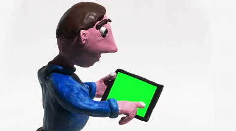 Man Using Smart Phone Tablet with Green Screen Clay Animation Isolated on White Stock Footage 58137816
