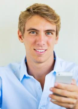 Man using smart phone, texting Stock Photos
