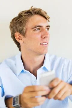 Man using smart phone, texting Stock Photos