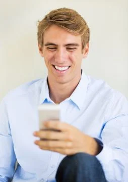 Man using smart phone, texting Stock Photos