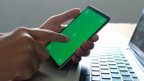 Man using a Smart phone Touchscreen CHROMA KEY Fingers make gestures touching Stock Footage 96329485