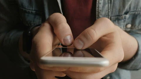 Man using smart phone, typing message Stock Footage 158609369