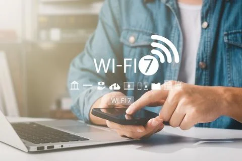 Man using smart phone with wifi technology 7 , connecting to the internet w.. Stock Photos