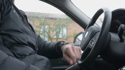 Man using smart watch in car Stock Footage 80968465