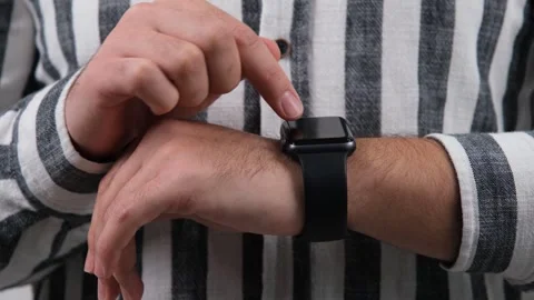 Man using smart watch Stock Footage 259612331