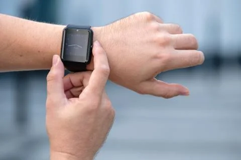 Man using smart watch Stock Photos