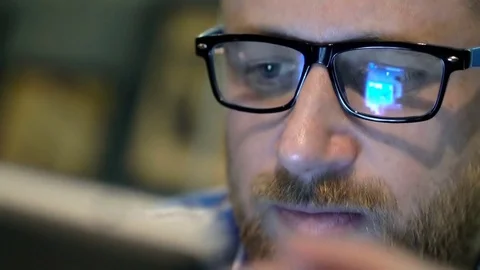 Man using smartphone and looks absorbed, close up, steadycam shot Stock-Footage 75907566