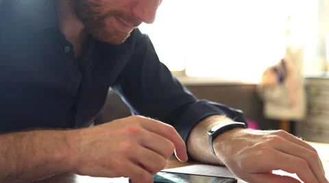 Man using smartphone and smartwatch Stock Footage 63298364