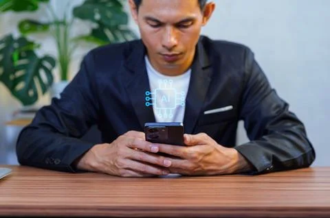 Man Using Smartphone with Artificial Intelligence Concept Overlay Stock Photos