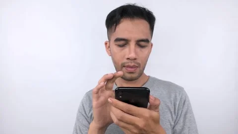 Man Using Smartphone - Browsing, Typing, and Interacting on Mobile Device. Stock Footage 315436050