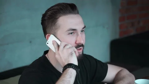 Man is using smartphone to call Stock Footage 86249098