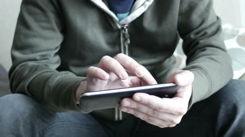 Man using smartphone to check on 動画素材 63250102