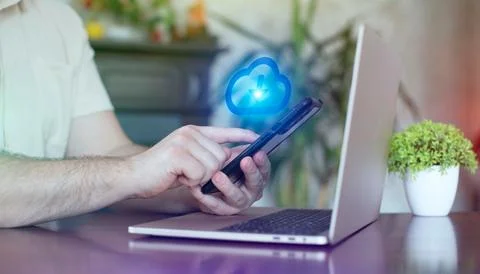 Man using smartphone with cloud computing icon. Internet technology and net.. Foto stock