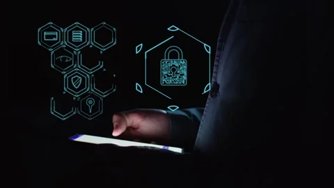 A man is using a smartphone in the dark and digital database security symbols Stock Footage 287562549