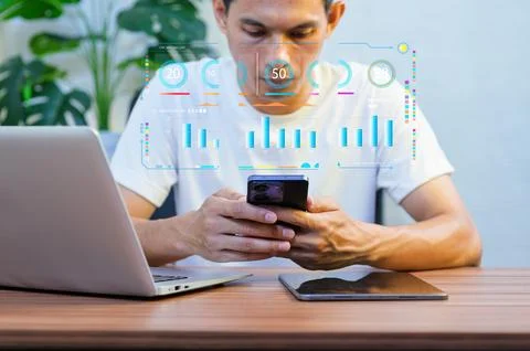 Man Using Smartphone with Data Analytics and Technology Elements 写真素材