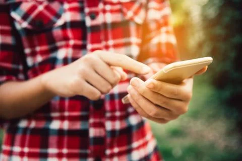 Man using smartphone for data connection and search to data Stock Photos