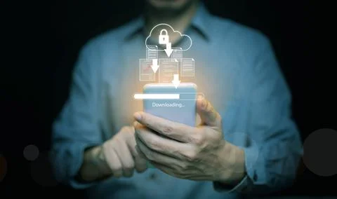 Man using smartphone with digital cloud download icon, symbolizing secure d.. Foto stock