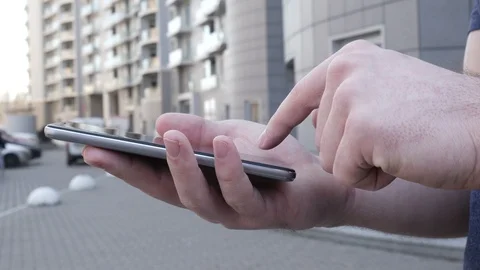 Man is using a smartphone Stock Footage 88289807