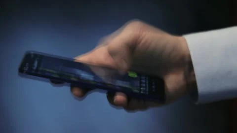 A man is using a smartphone Video stock 175712875