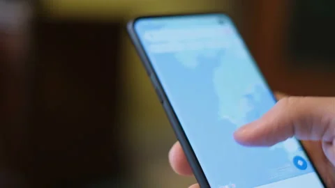 Man using smartphone google maps app for travel location search,gps positioning Video stock 152767700