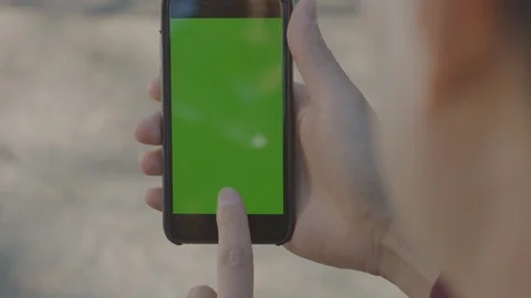 Man using a smartphone (green screen) Stock Footage 127109826