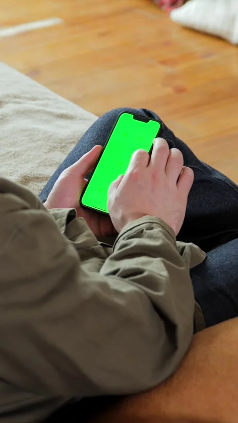 Man Using Smartphone With Green Screen Stock-Footage 320803725
