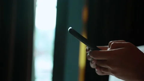 Man using smartphone in the living room at home, Hand typing message Stock Footage 141016112