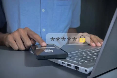 Man using smartphone to login for validate password to two-step authenticat.. Stock Photos