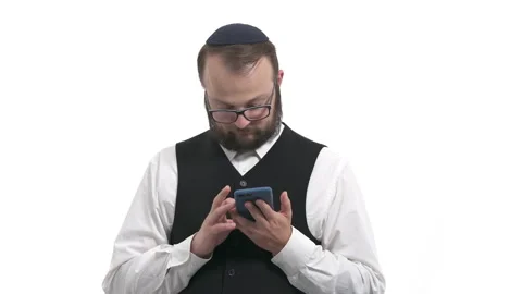 Man using smartphone. Model seriously and carefully reading news from gadget. Stock Footage 130179003