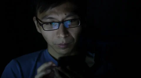 Man using smartphone at night Stock Footage 54305265