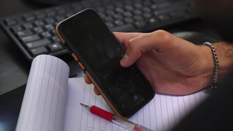 Man Using Smartphone At Office Desk Close Up Stock Footage 334100461