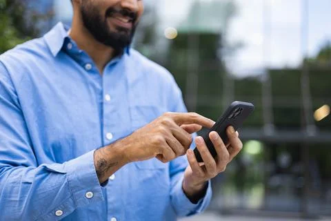 Man Using Smartphone Outdoors Stock Photos