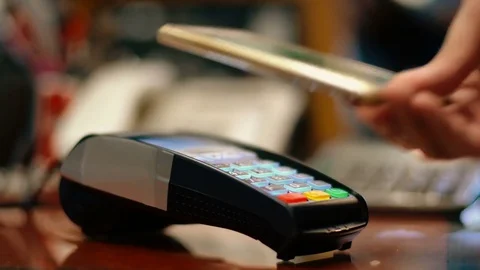 Man using smartphone to pay Stock Footage 82149289